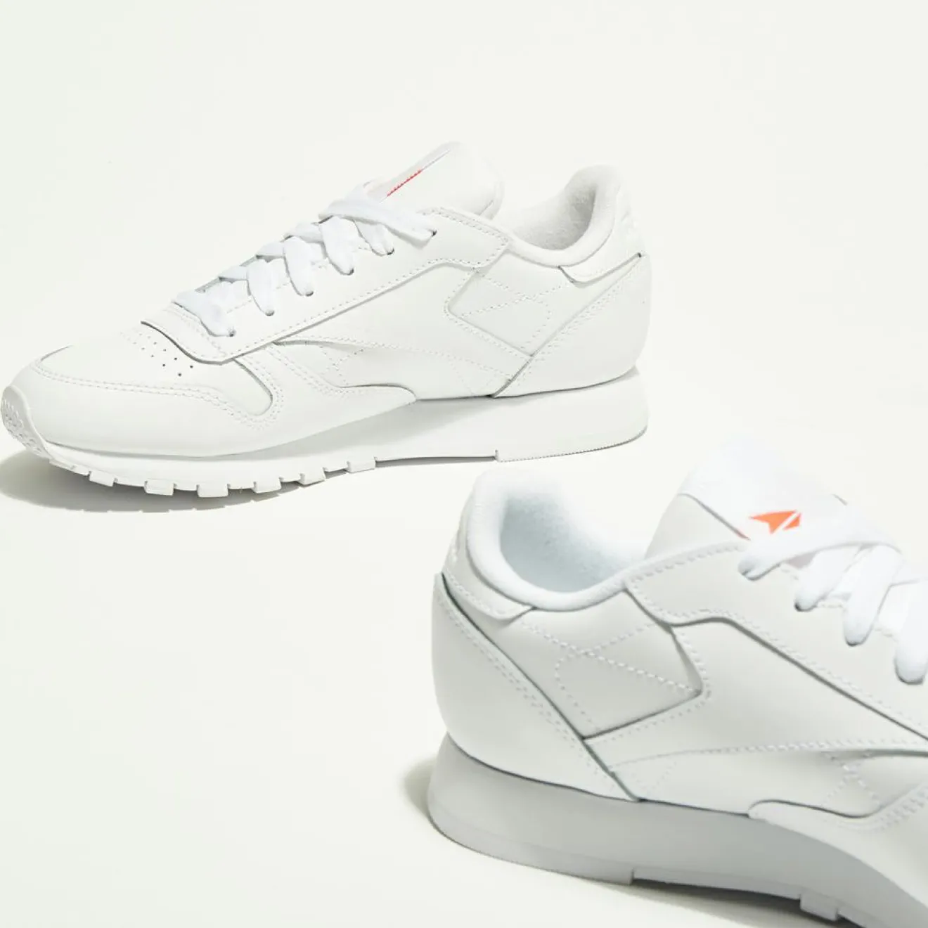 Femme Reebok Baskets en Cuir Cl Lthr Bicolore blanc/orange